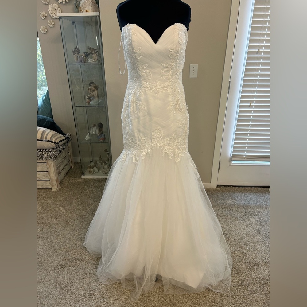 Rebecca Ingram “ Georgia” relays fit, and flare gown with corset back